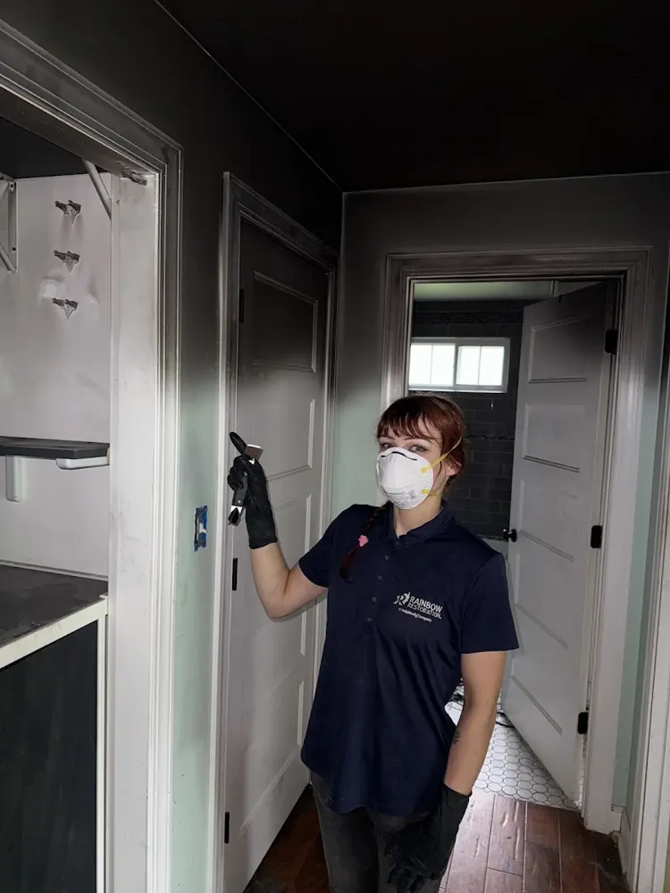Dryforce Water Damage technician in protective gear on a job in Rancho Cucamonga